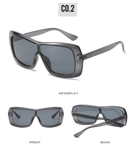 Three-angle view of oversized gray transparent Y2K sunglasses with smoky lenses