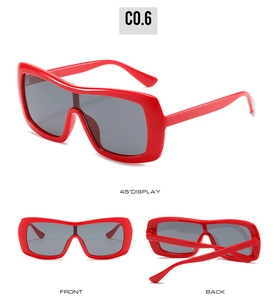 Three-angle display of red oversized square sunglasses featuring dark grey lenses