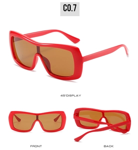 Three-angle view of oversized red sunglasses showing 45-degree, front, and back displays