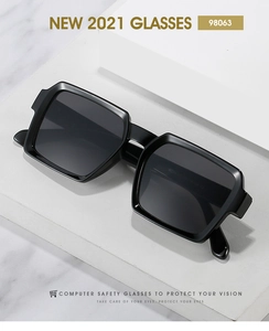 Macro detail of glossy black rectangular frame with hinge view and model 98063 on leg