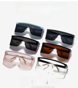 Selection of oversized wrap-around fashion sunglasses in various vibrant frame colors