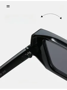 Close-up of durable metal reinforced hinge and model code on black square sunglasses