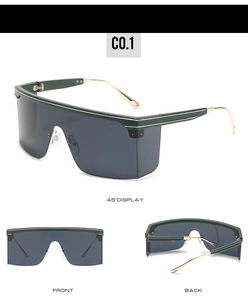 Detailed views of oversized sunglasses with dark lenses and gold metal temples