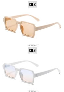 Close-up of cream and white rectangular sunglasses with light orange and purple tinted lenses