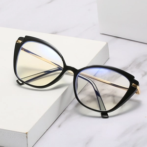 Fashion cat-eye blue light blocking glasses with black TR90 frames and gold metal temples