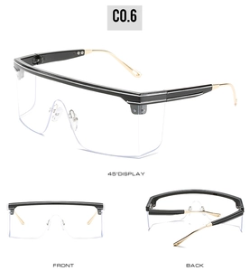 Three perspectives of oversized rimless shield sunglasses with black top bar and gold temples