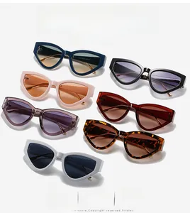 Detailed collection of cat eye sunglasses in seven colors on a white background