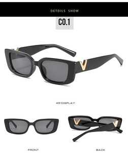 Detail of square black sunglasses featuring golden V-logo on the temple hinges