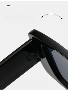 Close-up of durable metal hinge on black square frame sunglasses with smooth texture