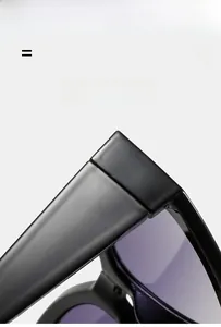 Detailed close-up of high-quality hinges on black cat-eye sunglasses with wide temples