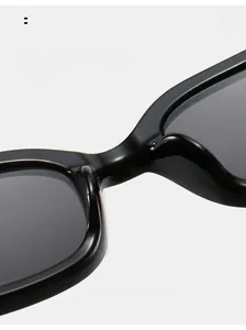 Detail of comfortable integrated nose pads on square black fashion sunglasses