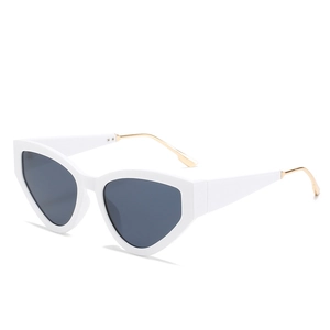 Fashionable white cat-eye sunglasses with dark grey lenses and slim gold metal temples