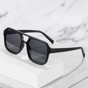 Vintage oversized square black frame sunglasses with dark lenses for a retro style