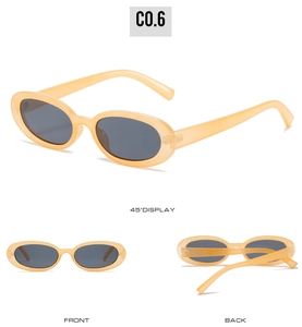 Vues détaillées de lunettes de soleil ovales rétro avec monture jaune et verres sombres