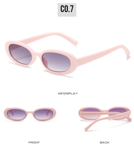 Vue détaillée de lunettes de soleil ovales rose bonbon avec verres dégradés violets