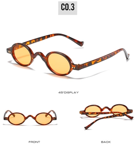 Detailed views of vintage oval sunglasses with tortoiseshell frames and amber lenses