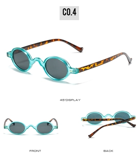 Detail view showing retro small oval sunglasses with blue jelly frames and tortoise temples