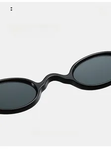 Macro shot of retro oval sunglasses with comfortable integrated nose pads and matte finish