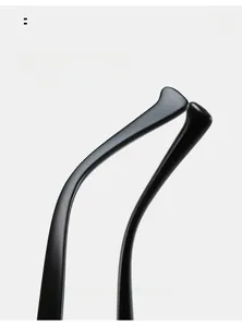 Detail view of the matte black curved mirror legs for comfortable eyewear fit