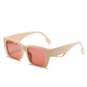 Chic oversized cream sunglasses with thick frames and orange lenses from a 45-degree angle