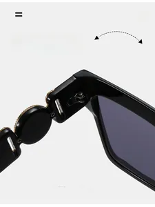 Detail of durable metal reinforced hinge and circular floral embossed decor on sunglasses