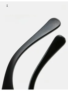 Detailed macro view of black matte curved temples designed for ergonomic comfortable wear