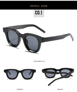 Detailed views of vintage oval black sunglasses with dark grey lenses and thick frame