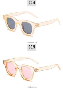 Detailed 45-degree angle display of oval retro sunglasses in champagne translucent frames