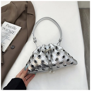 Detail of silver geometric handbag with metal eyelets and pearl chain strap