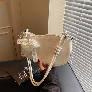 Chic off-white pleated leather shoulder bag with pearl heart and lace bow detail