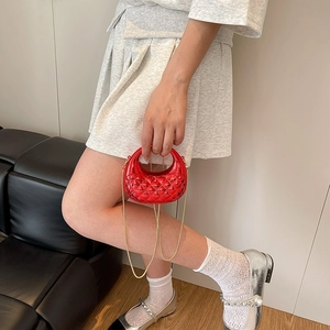 Metallic red quilted crescent bag with gold chain strap, luxury mini handbag for parties