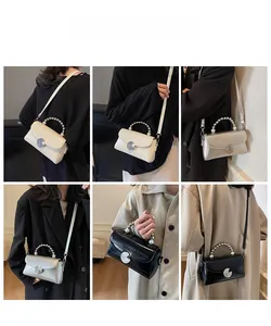Mini flap square bag with pearl handle shown in crossbody and shoulder carry styles