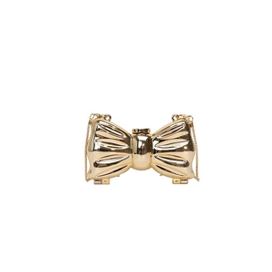 Polished gold bow-shaped metal evening clutch bag with elegant chain shoulder strap