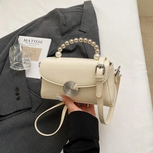 Chic off-white square handbag with pearl handle and silver spiral metal buckle