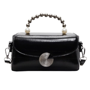 Elegant black glossy square handbag with unique pearl and silver bead handle