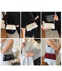 Close-up of stylish rectangular crossbody bag with lace-up detail in multiple colors
