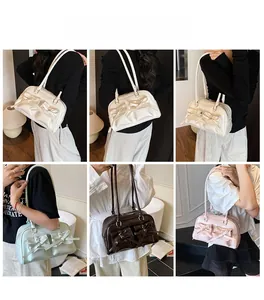 Detailed views of women's shoulder bag with bow accents in white, brown, pink, and green