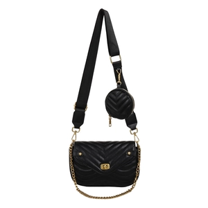 Black quilted crossbody bag with golden chain strap and matching small round coin purse