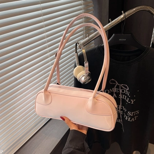 Pink glossy faux leather oversized baguette bag with shoulder strap and silver zipper