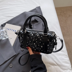 Chic black quilted Boston bag with silver rhinestones and dual handles for women