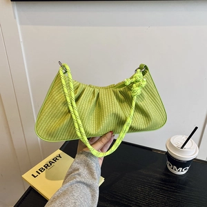 Lime green woven cloud underarm bag with knot strap and stylish ruched texture