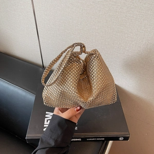 Elegant gold rhinestone mesh handbag for evening parties with luxury handheld design