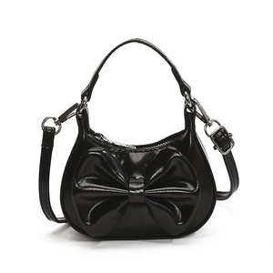 Mini-Schultertasche für Mädchen in Schwarz mit Schleife und verstellbarem Schultergurt