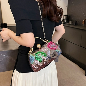 Elegant sequined embroidery clutch with forest pattern and golden handle for evening wear
