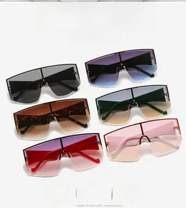 Flat top oversized sunglasses showcase in gradient black, purple, brown and pink hues