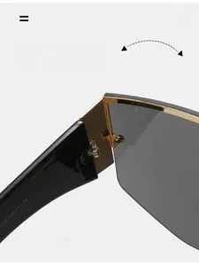 Close-up of durable golden metal hinge and frame specifications on black sunglasses