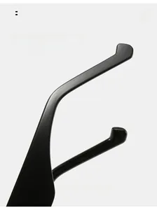 Detail of ergonomic curved temple tips on matte black sunglasses for comfortable wearing