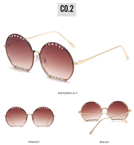 Vues détaillées de lunettes de soleil rondes demi-cerclées avec strass et monture dorée