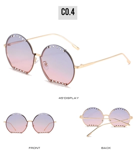 Trois angles de lunettes de soleil rondes strass avec verres dégradés et détails coupés