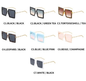 Detailed grid of oversized square sunglasses featuring chic gold chain temples in seven colors